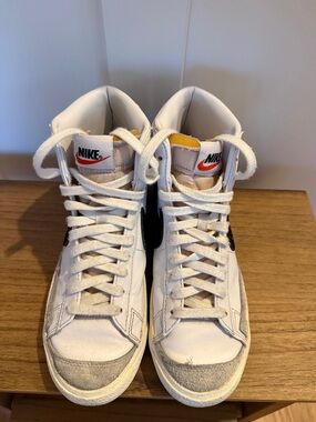 Nike White and Black High-Top Sneakers with Yellow Tongue Accents